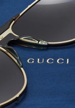 Gucci - Unisex Sonnenbrille - Gold-coloured/brown 7 Gucci - Unisex Sonnenbrille - Gold-coloured/brown -Günstiges Gucci || Knirps Geschäft 018c57f8c87146bd89af03ec002ec754
