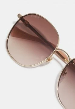 Gucci Sonnenbrille - Gold-coloured/brown - Damen 9 Gucci Sonnenbrille - Gold-coloured/brown - Damen -Günstiges Gucci || Knirps Geschäft 4d31201e98a344fcb613b221e2e8f48d